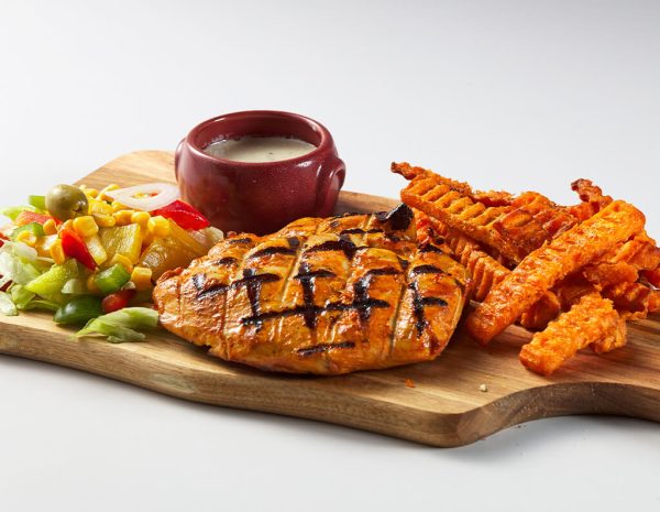 The Engine Luton Chicken Butterfly Flame-grilled with crispy skin served in your choice of sauce.